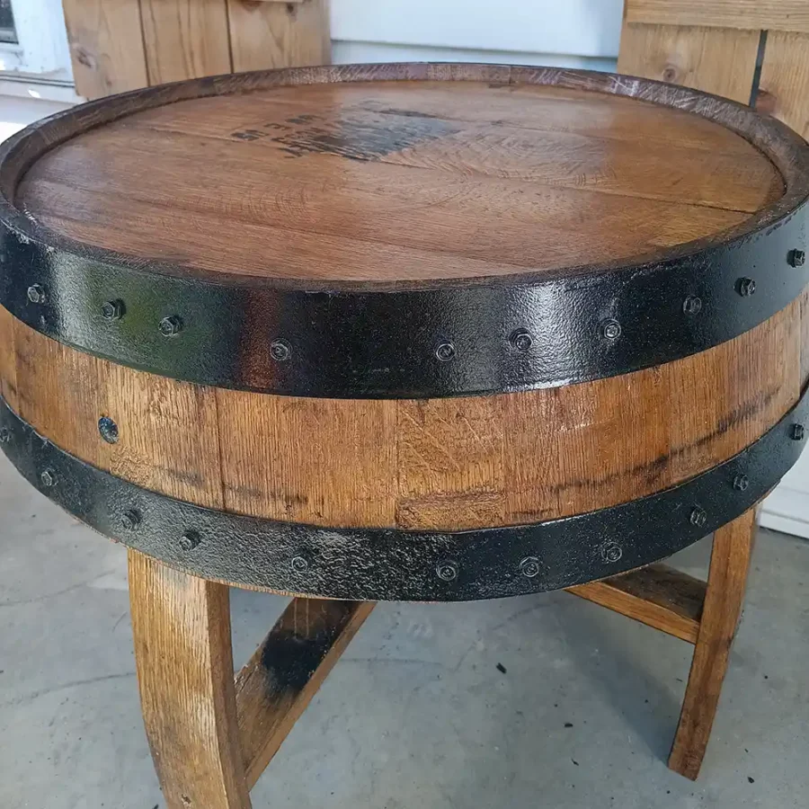 Barrel end table with chestnut stain and black metal rings