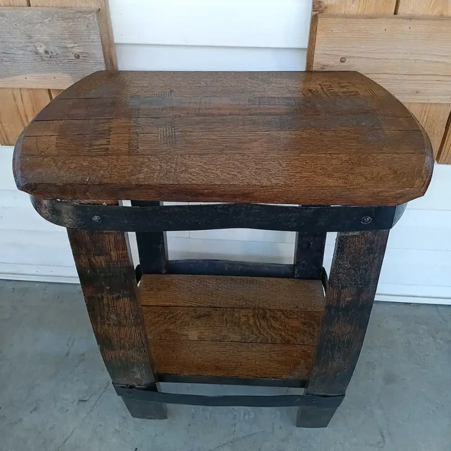Rustic barrel end table with metal accents and dark stain