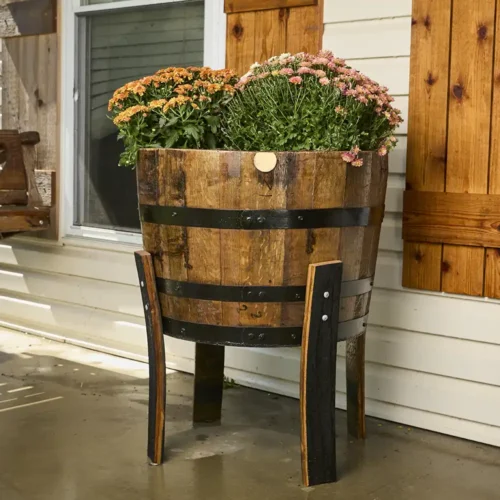 Taller elevated barrel planter with colorful flowers