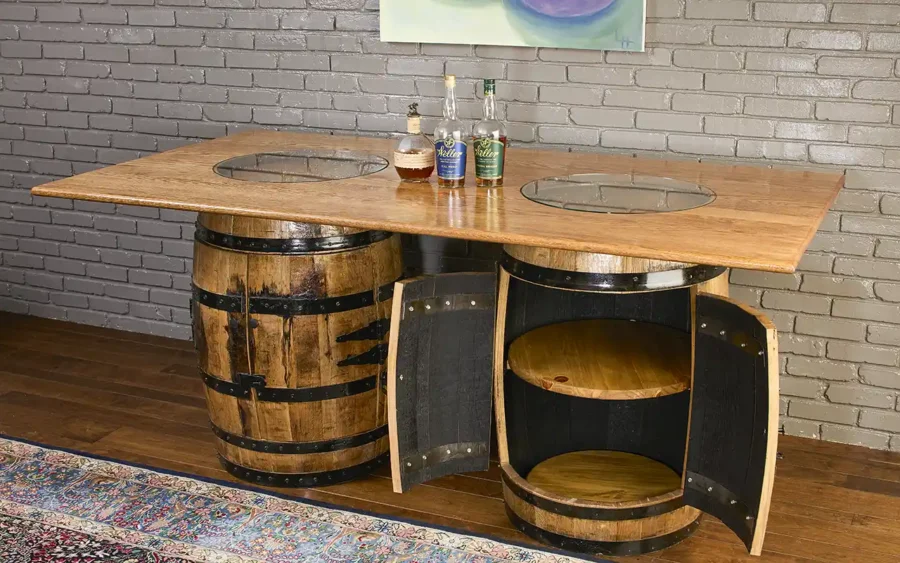 Two whiskey barrel cabinets with doors used as a base for a table top. 2 Lazy susans inside the barrel on the right side.