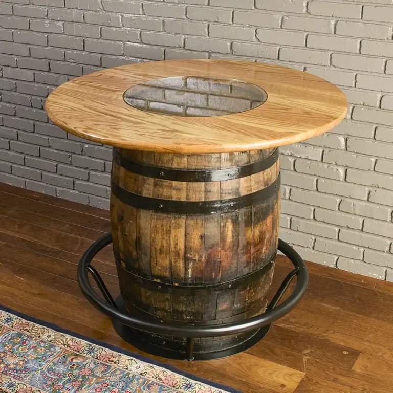 Bourbon Whiskey barrel table with a round solid oak tabletop and metal footrest. Table has a glass insert in the middle to show the distillery stamp on the barrel