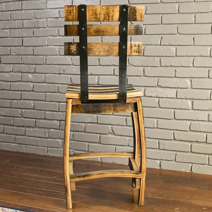 Back side of whiskey barrel stave chair showing the metal backrest pieces