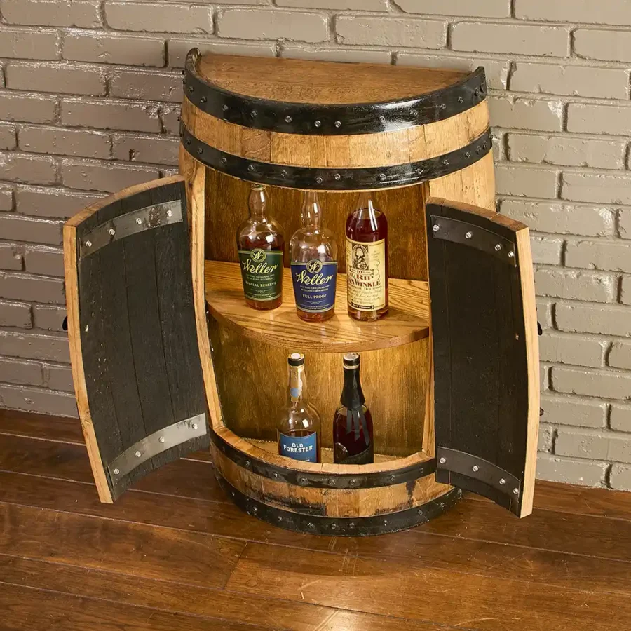 Half bourbon barrel cabinet with doors open and bottles inside with a solid oak shelf