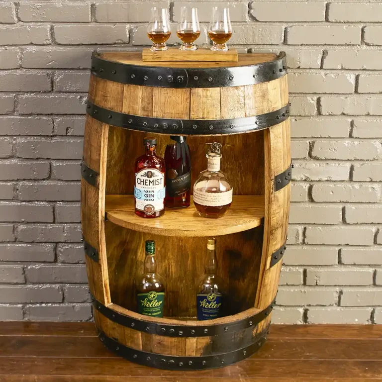Half whiskey barrel cabinet with liquor bottles on a solid oak shelf