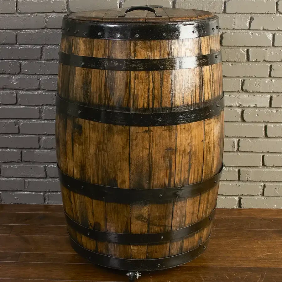 Whiskey barrel trash can cover with lid closed and wheels underneath for easy moving