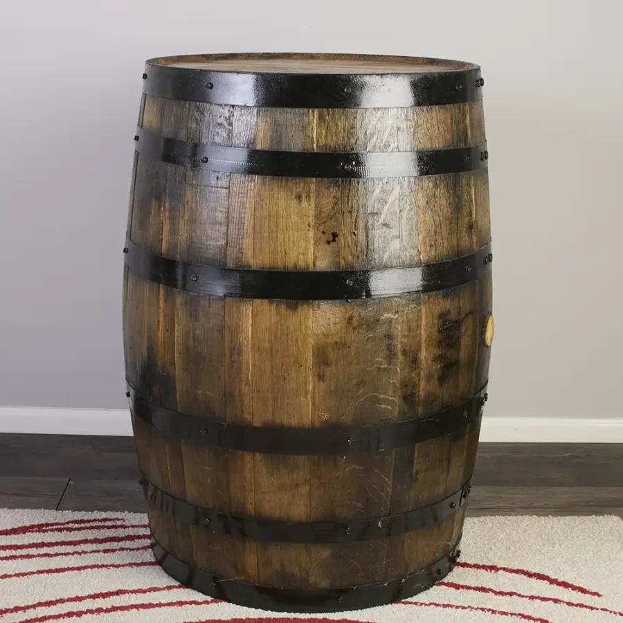 side view of refurbished bourbon barrel featuring metal rings that are painted black