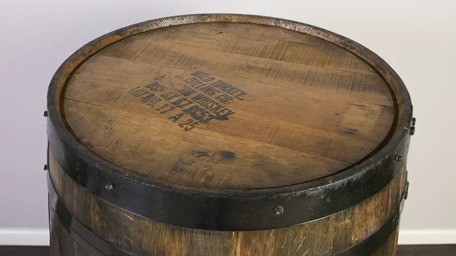 Top of refurbished bourbon barrel featuring a wild turkey stamp