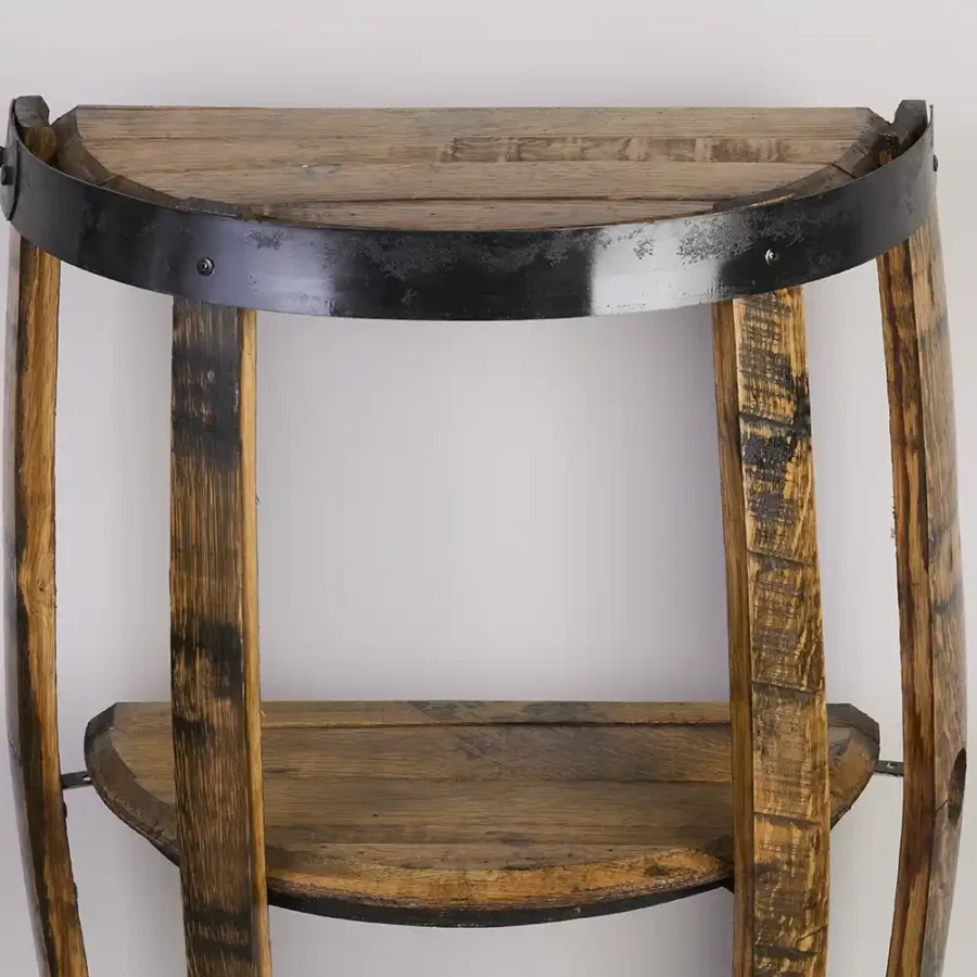 Metal hoops on the 3 shelf barrel lid end table are painted black to accent the item.