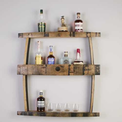 3-tiered barrel stave shelf with liquor bottles on each shelf