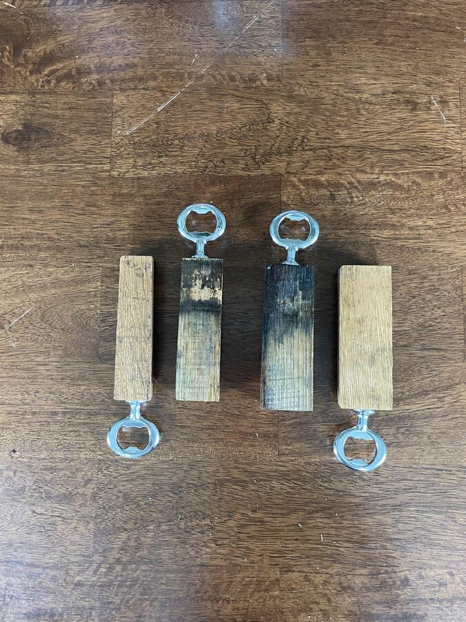 Whiskey stave handheld bottle opener