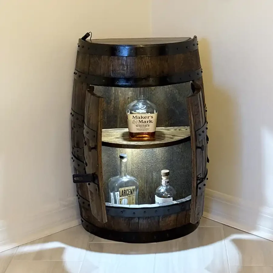Whiskey barrel cabinet with doors open and internal lighting